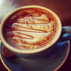 Close-up of coffee cup on table