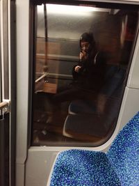 Man sitting in train