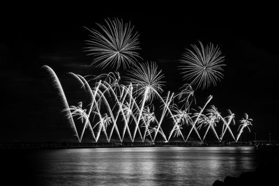 Photograph of fireworks at night, long exposure magical effect.