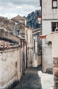 Alley amidst buildings in town