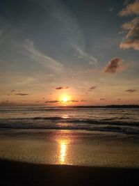 Scenic view of sea against sky at sunset