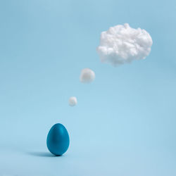 Close-up of blue sky over white background