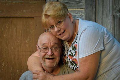 Portrait of smiling man with woman