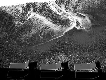 High angle view of buildings by sea
