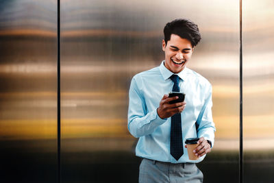 Young man using mobile phone