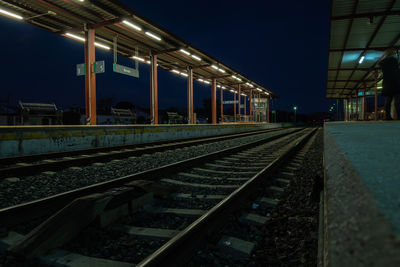 View of tracks at the train station in ronda at night.