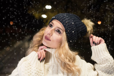 Portrait of young woman in park