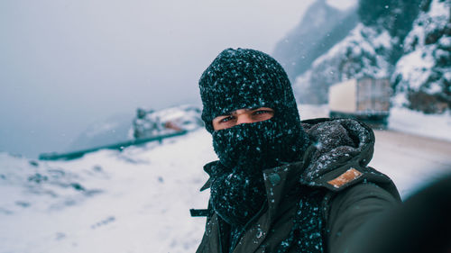 Portrait of man wearing hat during winter