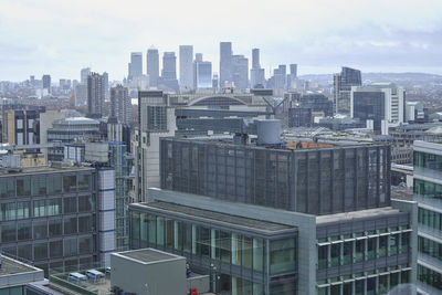 Modern buildings in city against sky
