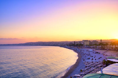 High angle view of beach against sky during sunset