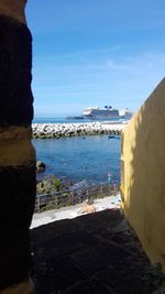 Scenic view of sea against blue sky