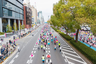 Group of people on road in city