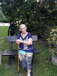 Portrait of smiling woman in park