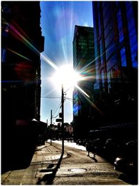 Sun shining through building