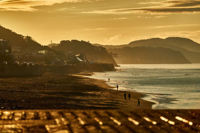 Scenic view of sea against sky during sunrise 