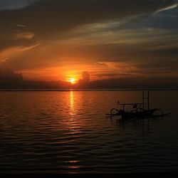 Scenic view of sunset over sea