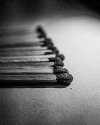 Close-up of matchsticks on table