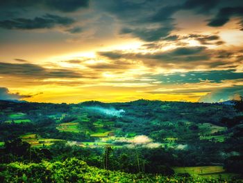 View of countryside landscape at sunset