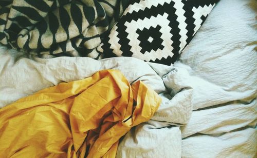 Close-up of blanket on bed at home