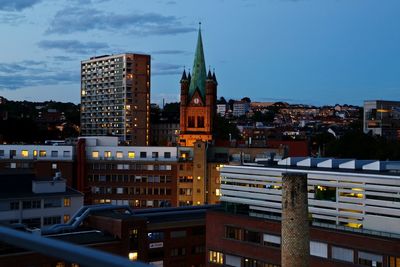 City lit up at dusk