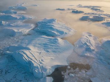 Aerial view of snow covered landscape