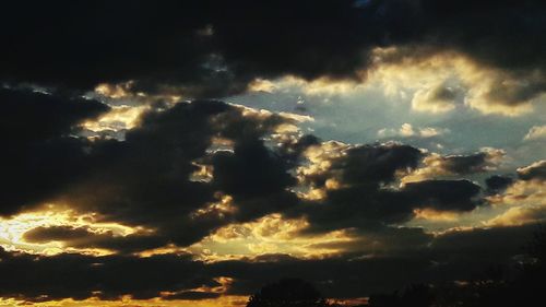 Low angle view of clouds in sky during sunset