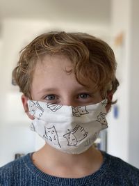 Portrait of boy wearing mask