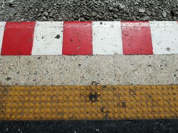 High angle view of road sign on street