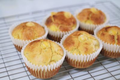 Close-up of hummus muffins on cooling rack at table