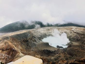 Panoramic view of volcanic landscape against sky