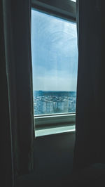 Sea seen through glass window