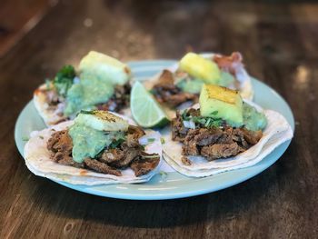 High angle view of food served on table