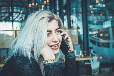 Portrait of smiling young woman