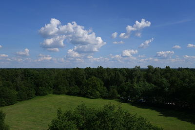 Scenic view of landscape against cloudy sky