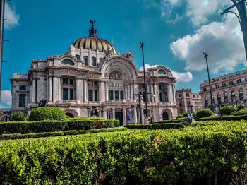 View of historic building against cloudy sky