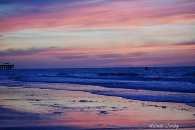 Scenic view of beach during sunset