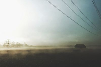 Scenic view of landscape against cloudy sky