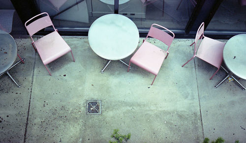 High angle view of empty seats on tiled floor