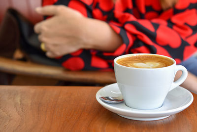 Coffee cup on table