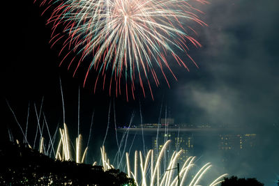 Firework display at night