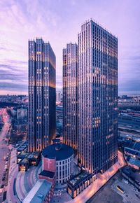 High angle view of buildings in city against sky