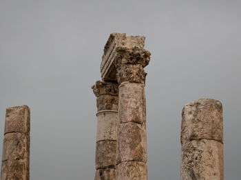 Low angle view of old ruins against clear sky