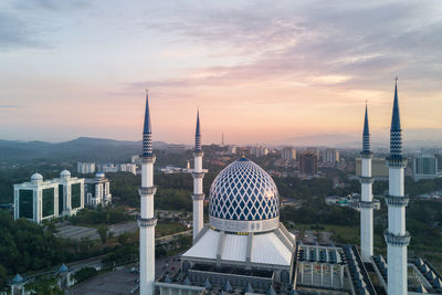 Skyscrapers in city against sky