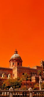 View of historic building against sky during sunset
