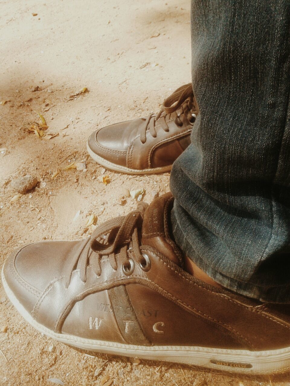 shoe, low section, high angle view, person, sand, jeans, footwear, close-up, indoors, part of, pair, human foot, dirty, beach, sunlight, day, men