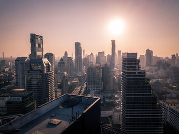 View of cityscape against sky during sunset