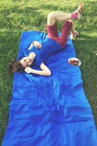 People on grassy field