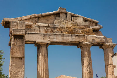 Low angle view of old ruin building against sky