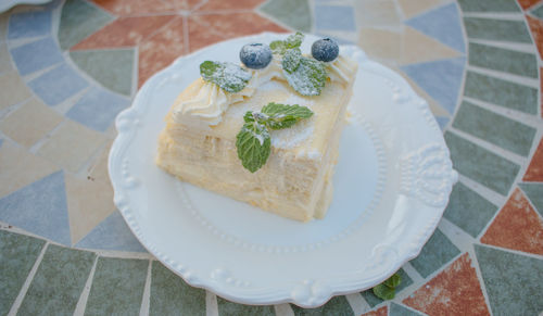 High angle view of cake in plate on table