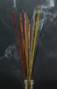 Close-up of multi colored pencils in temple